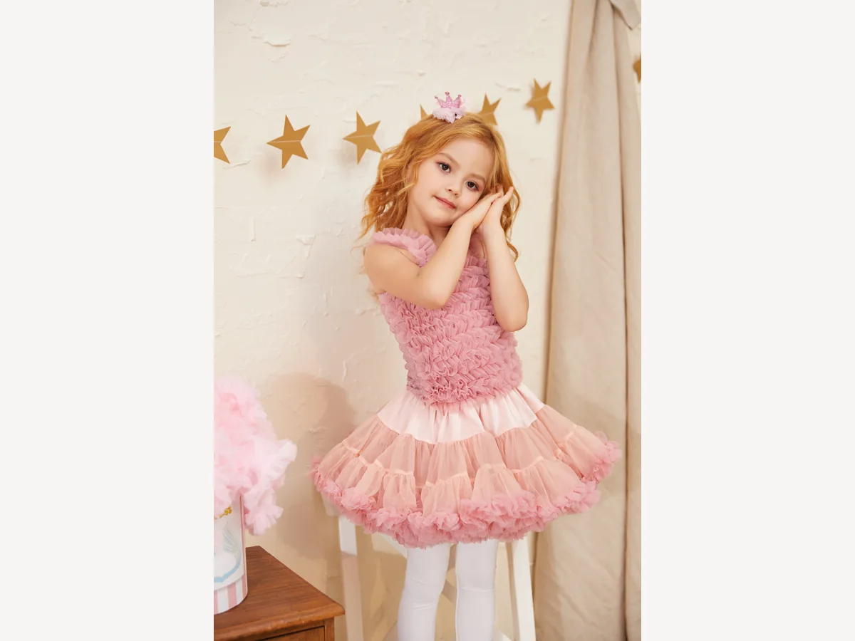Girl wearing a pink layered tulle pettiskirt